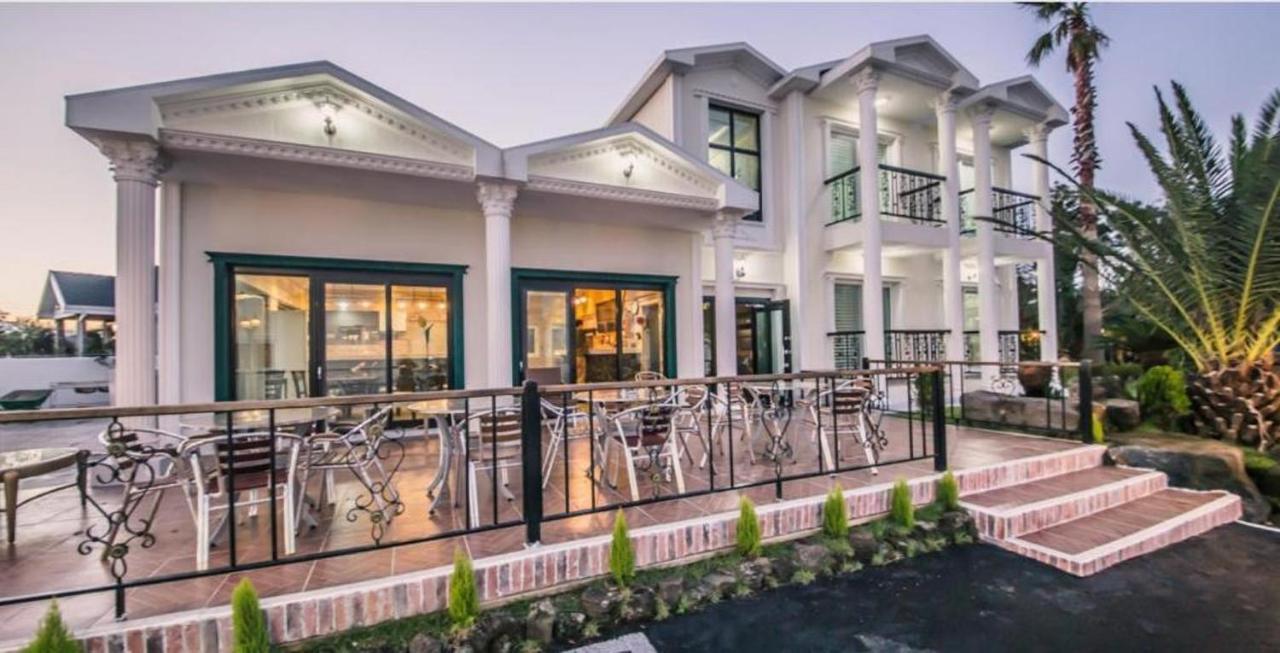 Jeju Washington Pension Согвипхо Экстерьер фото